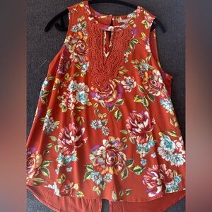 Daniel rainn,‎ orange top with flowers and lace details.